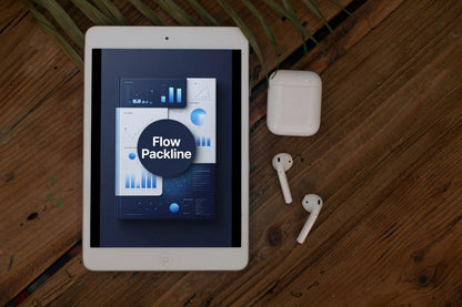 Tablet displaying a software interface with 'Flow Packline' on a wooden surface with AirPods.