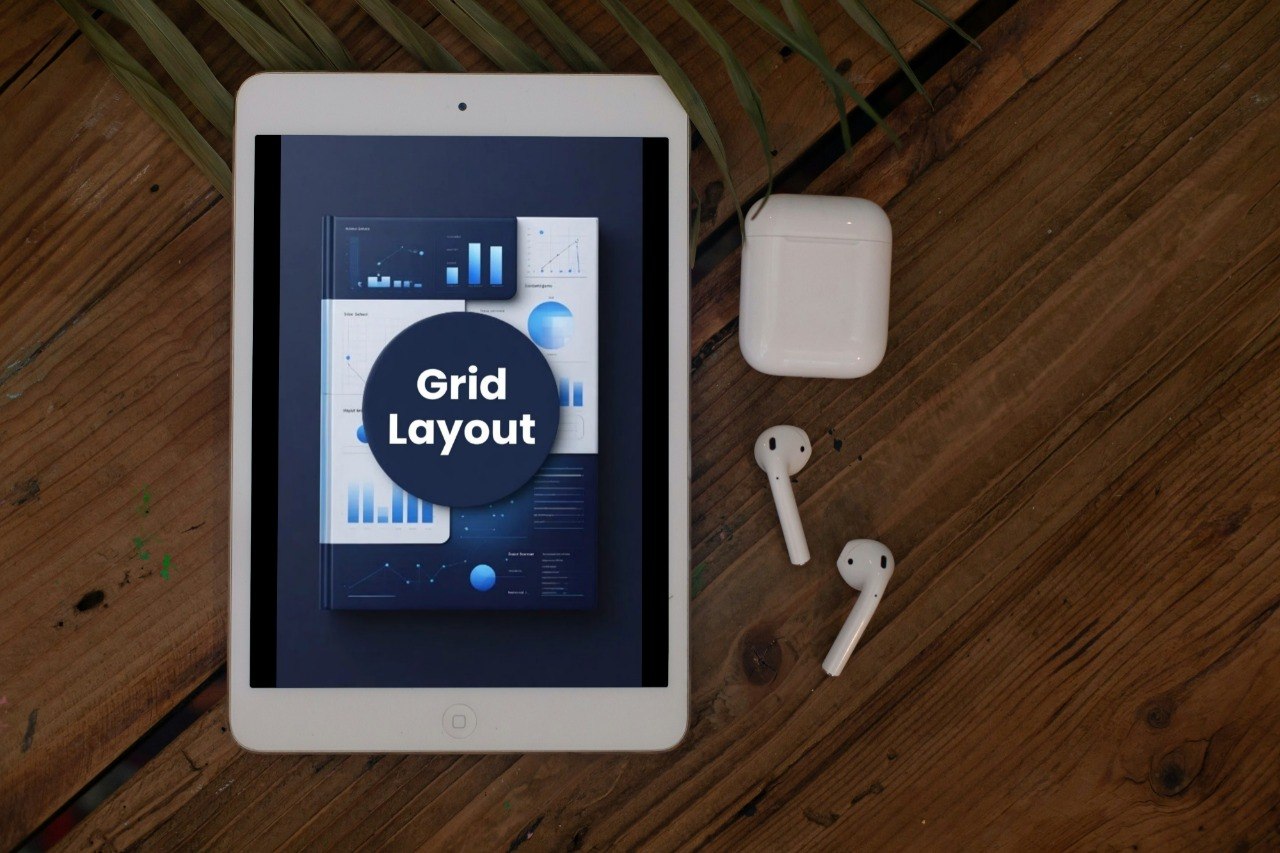Tablet displaying a grid layout on a wooden surface with AirPods.
